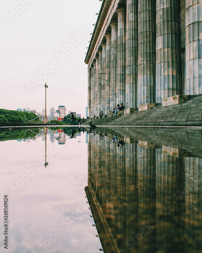 Reflection of a puddle in front of the building of the Buenos Aires Law University - Facultad de Derecho de Buenos Aires, Argentina