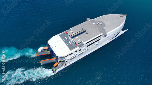 Bilde på lerret Aerial drone top view photo of high speed passenger ferry arriving at port of My