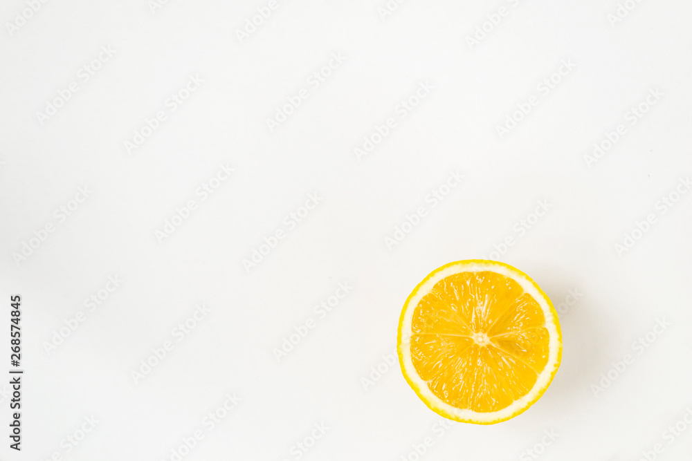 A round slice of lemon, on a white background, A round slice of lemon, on a white background,