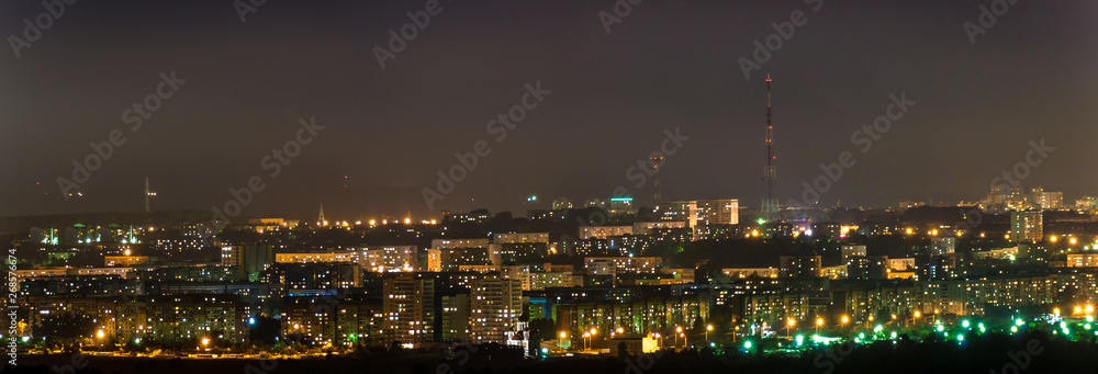 night city lights panorama, television tower and temple