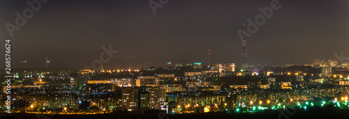 night city lights panorama, television tower and temple