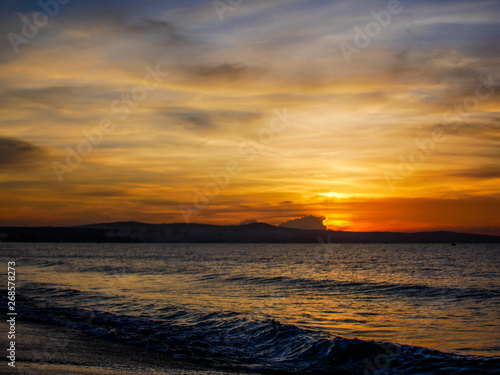 beautiful sunrise sunset with clouds sea © MFomin