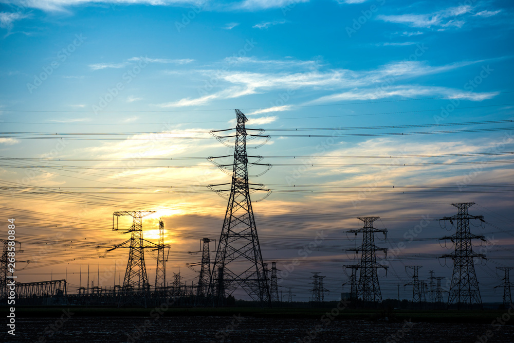 Silhouette of Power Supply Facilities at Sunset