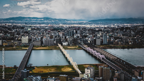 Osaka City view and Yodogawa River in Japan on Floating Garden Rooftop observation area and panorama 360 views of Umeda Sky Building in Japan photo