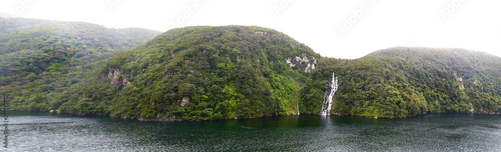 Panoramic Photo of beautiful scenery in Fiordland National Park, South Island, New Zealand. Misty Cloudy Morning