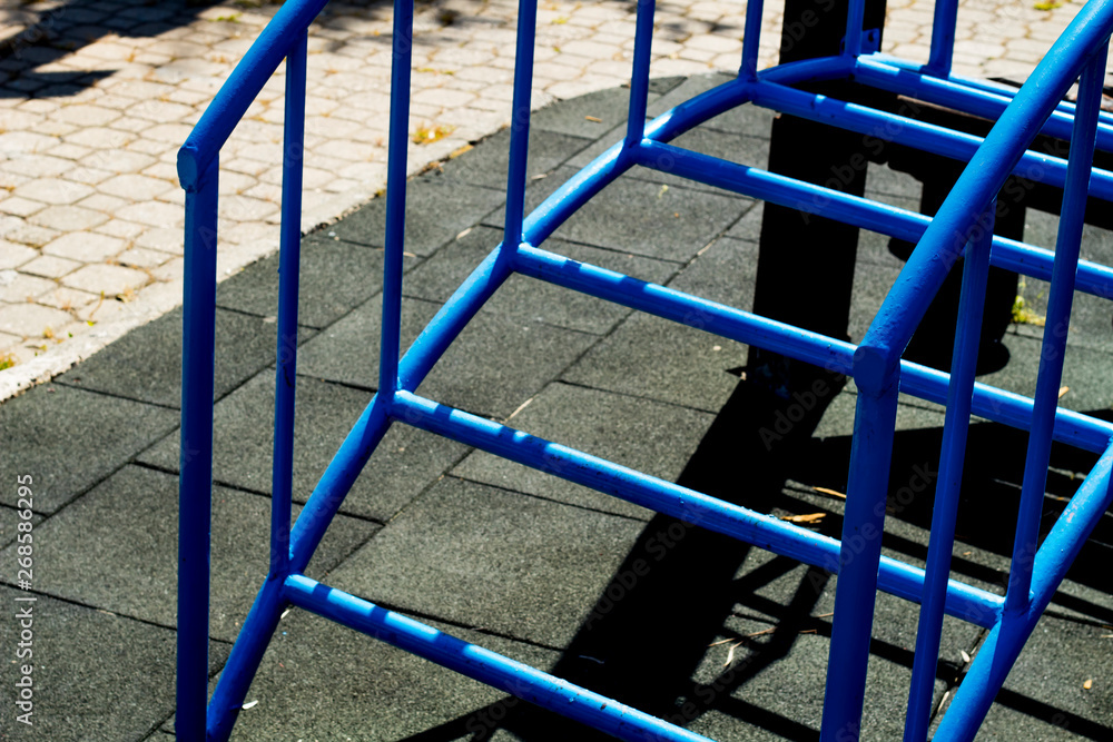 Blue irons arranged parallel to each other Blue irons arranged parallel to each other