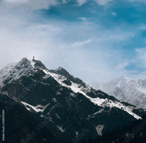 Amazing mountain landscape with colorful vivid cloudy sky, natural outdoor travel background. Beauty world and hiker climbing mountains
