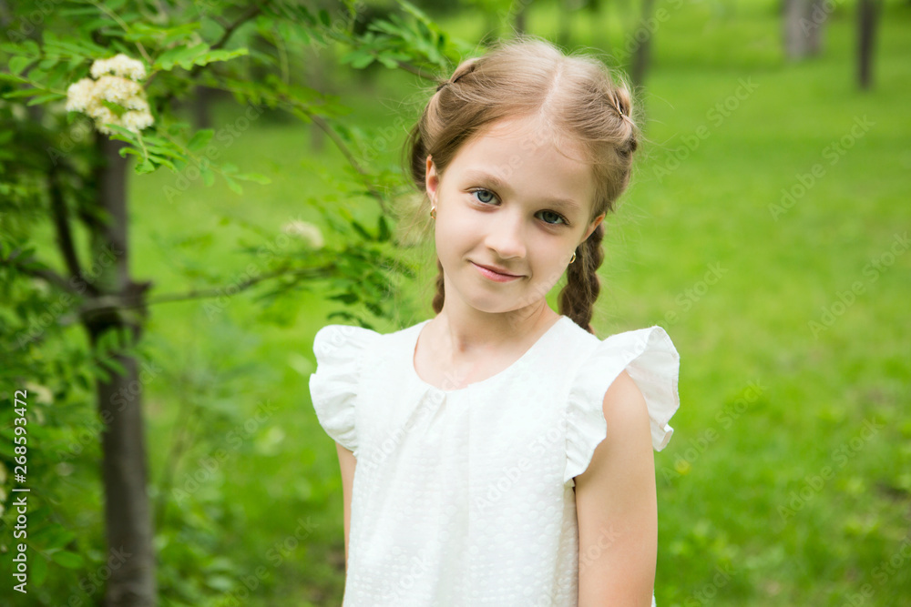 little girl playing in the summer outdoors little girl playing in the summer outdoors
