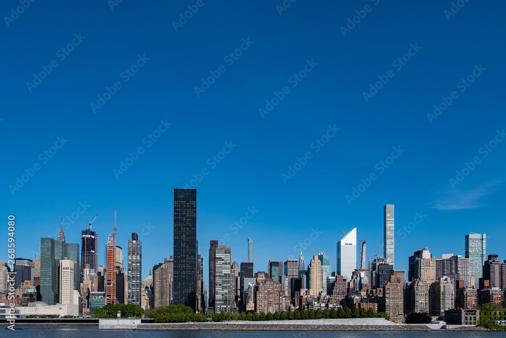 Midtown Manhattan cityscape on a bright sunny day Midtown Manhattan cityscape on a bright sunny day