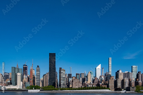 Midtown Manhattan cityscape on a bright sunny day