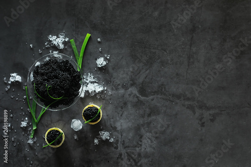 Fresh black fish roe. Beluga caviar served with ice.