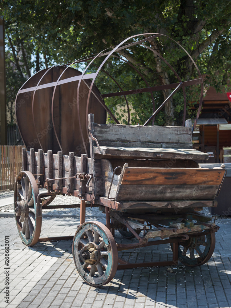 Antique Wooden Wagon With Wheels and Metal Structure