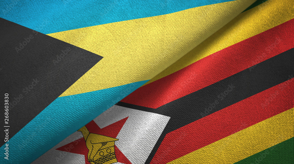 Obraz premium Bahamas and Zimbabwe two flags textile cloth, fabric texture