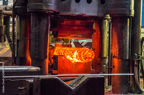 Steel ingot in hydraulic forging press
