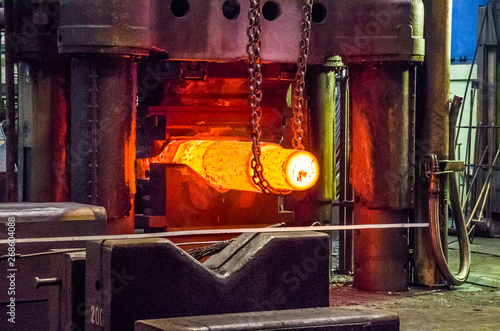Steel ingot in hydraulic forging press