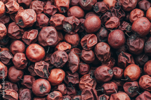 Close Up of Red dried jujube. Ziziphus mauritiana, also known as Chinese date, ber, Chinee apple, jujube, Indian plum, Regi pandu, Indian jujube, dunks (in Barbados) and masau