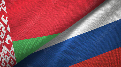 Belarus and Russia two flags textile cloth, fabric texture