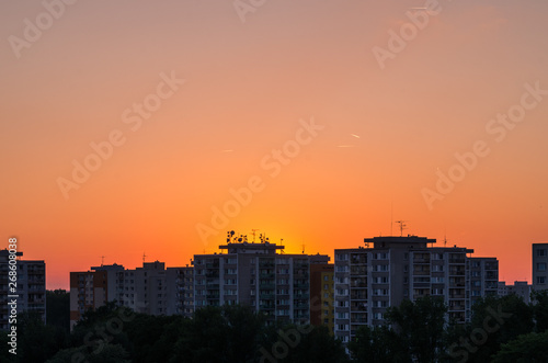 Sunset over city landscape