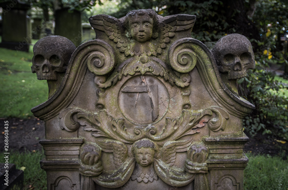 Memento mori grave on old graveyard in Edinburgh, Scotland