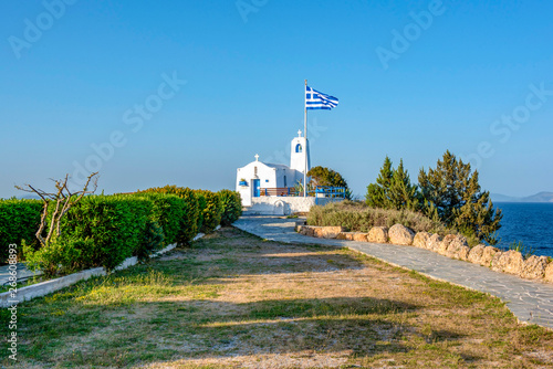 A  white small orthodox chapel dedicated to St.Nikolaos. Rafina,Greece photo