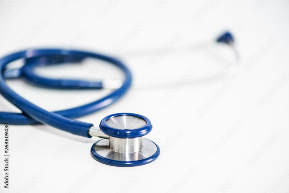 Top view blue stethoscope on white background. For check heart or health check up concept Top view blue stethoscope on white background. For check heart or health check up concept