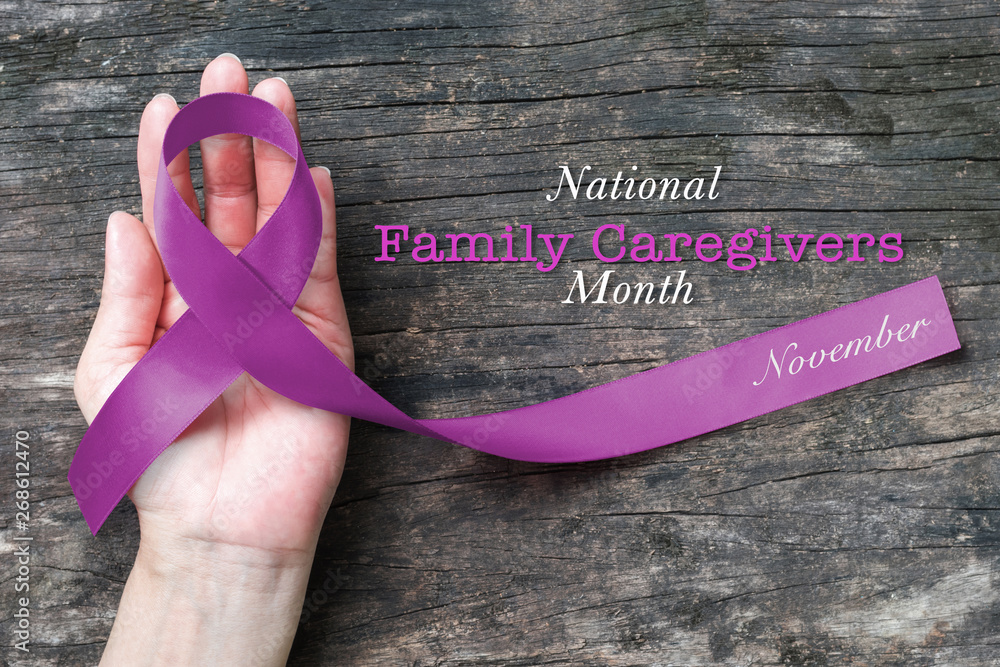 National family caregivers month in November month concept with plum purple ribbon  awareness - obrazy, fototapety, plakaty 