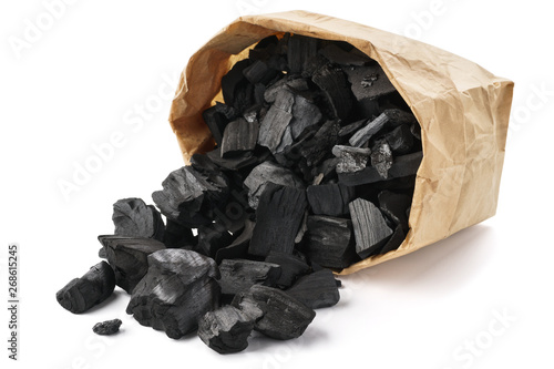 Fotografie Paper bag of charcoal isolated on a white.
