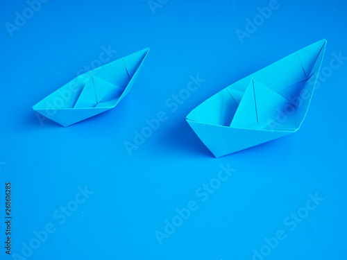 Monopoly business origami boat paper