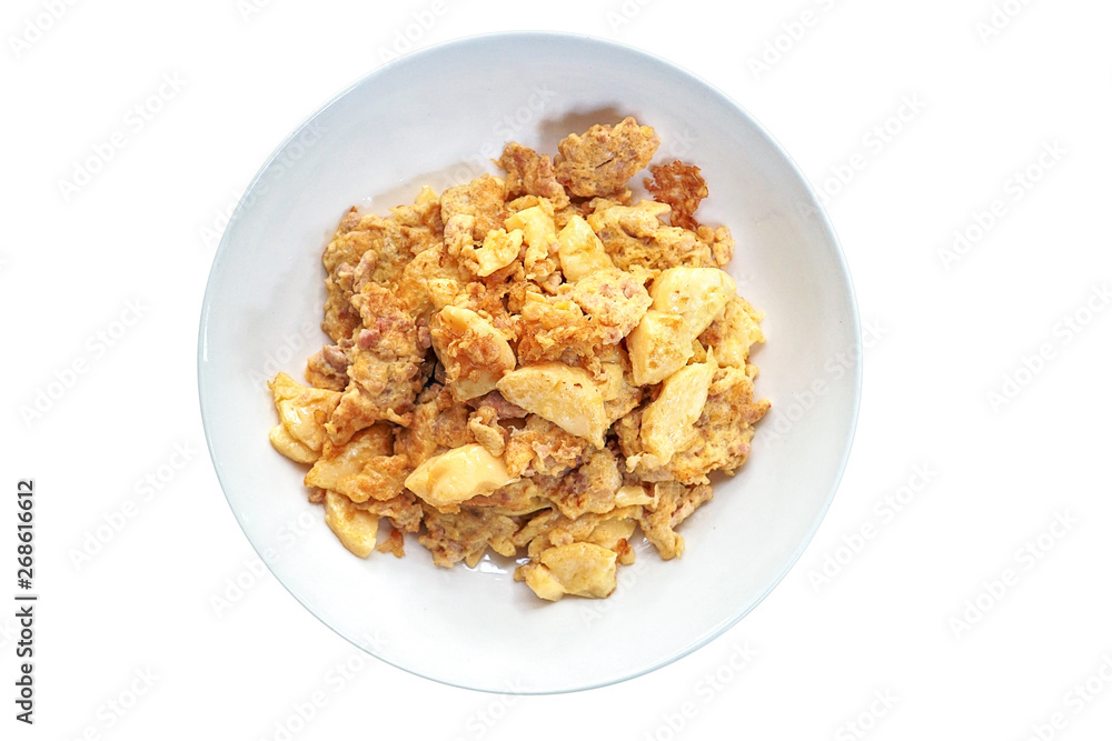 Top view of Pork omelette, stirred eggs with pork and tofu in white plate. isolated on white background. This image stacked with clipping path for advertising. Food and healthy concept. Top view of Pork omelette, stirred eggs with pork and tofu in white plate. isolated on white background. This image stacked with clipping path for advertising. Food and healthy concept.