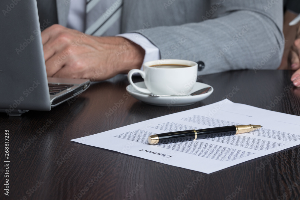 Businessman work with contract document Businessman work with contract document