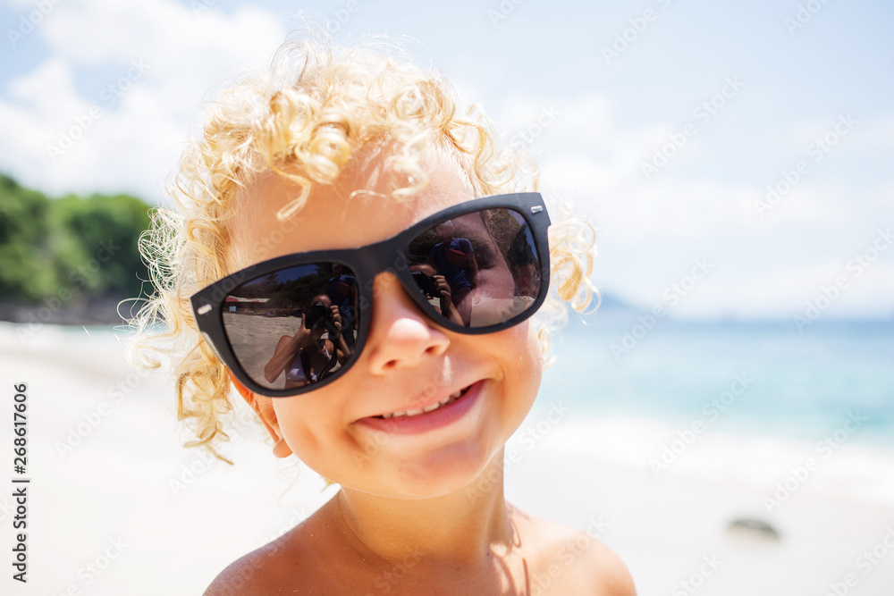 boy are playing on the beach boy are playing on the beach