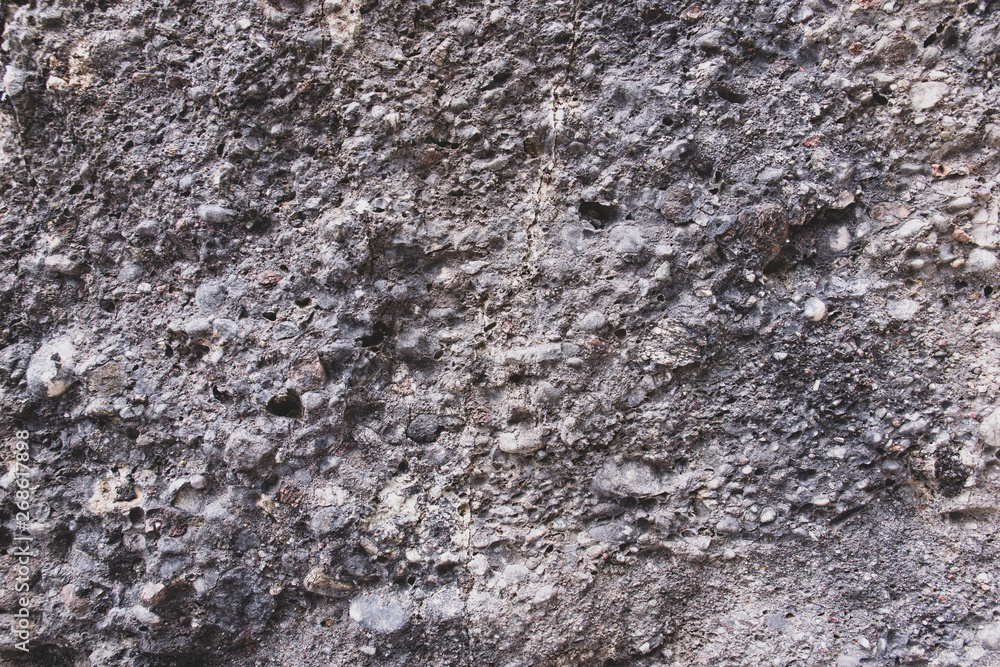 Naklejka premium old rough, weathered, textured rock surface
