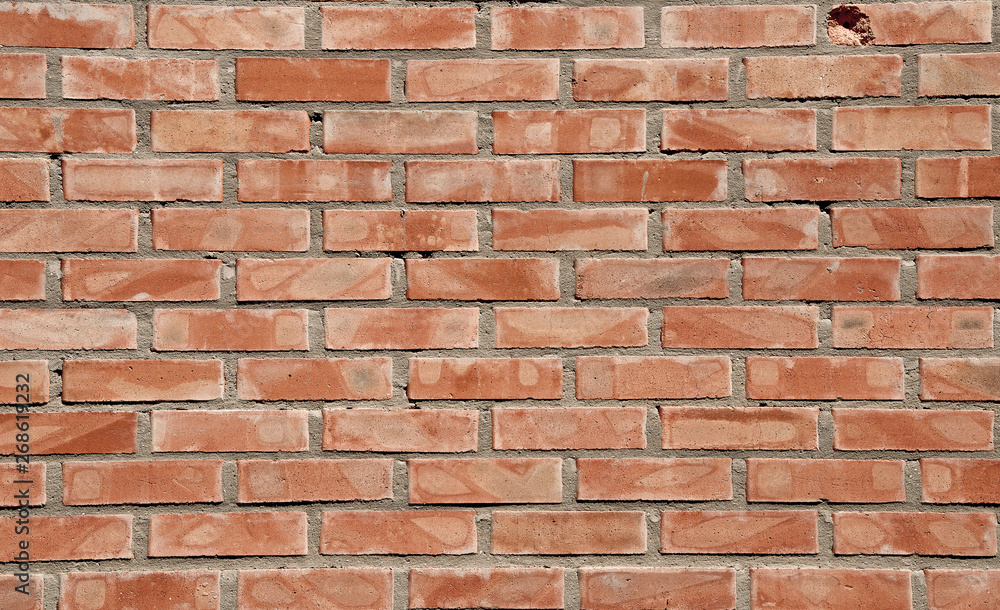 Bricks background and textures on the wall. Poor brick cracks. Slits Damage. Scratches. Bricks background and textures on the wall. Poor brick cracks. Slits Damage. Scratches.