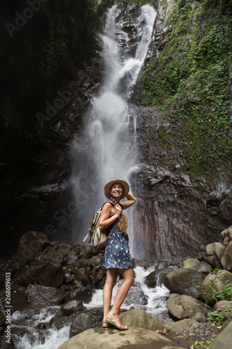 Woman near waterfal on Bali  Indonesia  