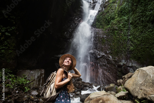 Woman near waterfal on Bali  Indonesia  
