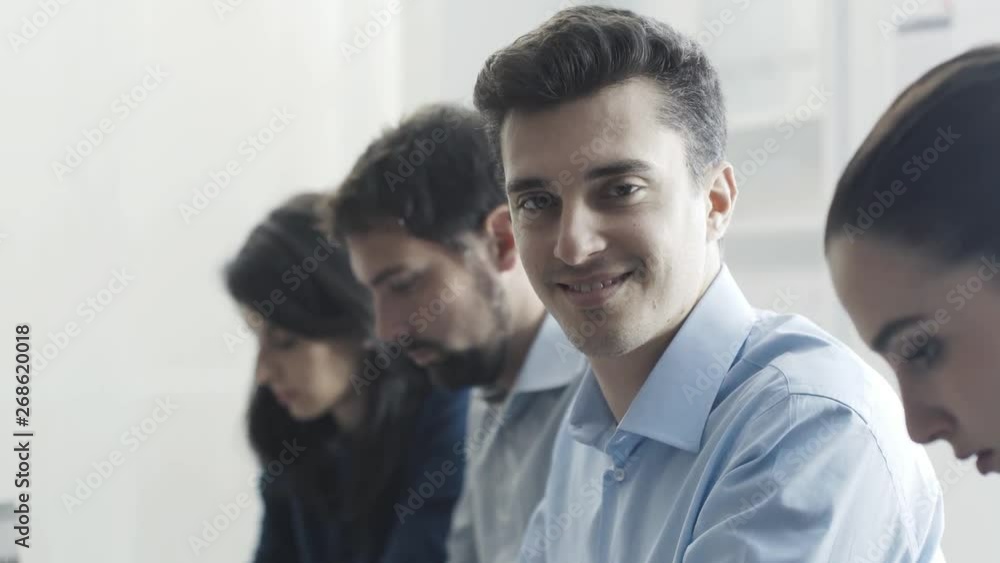 Efficient business team working at office desk Efficient business team working at office desk