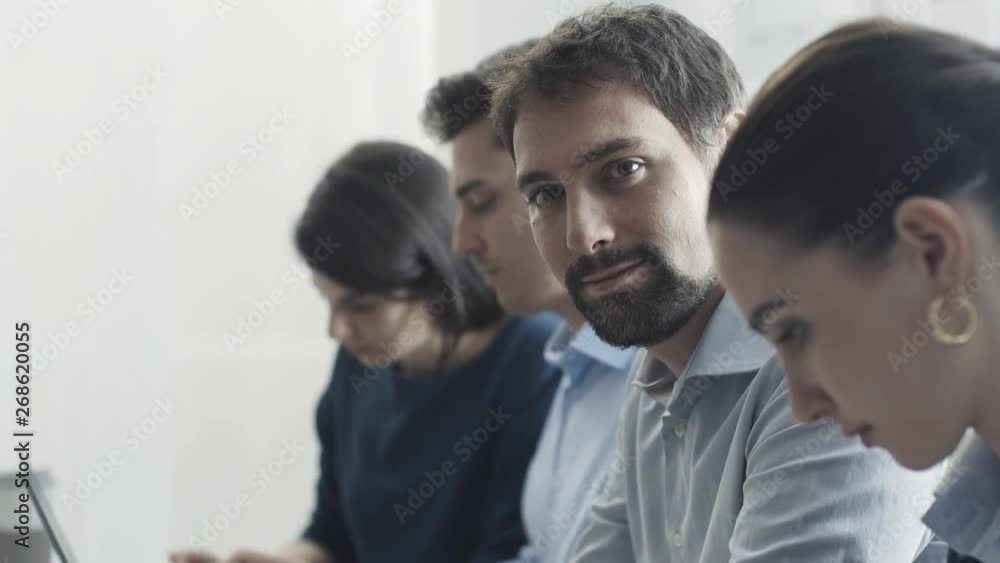 Efficient business team working at office desk Efficient business team working at office desk