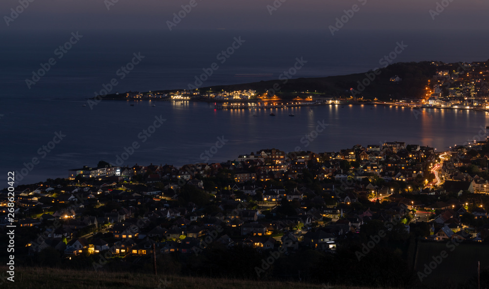 Overlooking the bay in the evening with lights