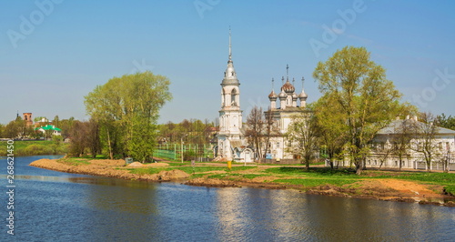Ancient Sretensky temple on  river bank in  city of Vologda