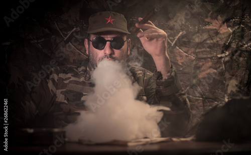Fotografía The evil dictator sitting on table