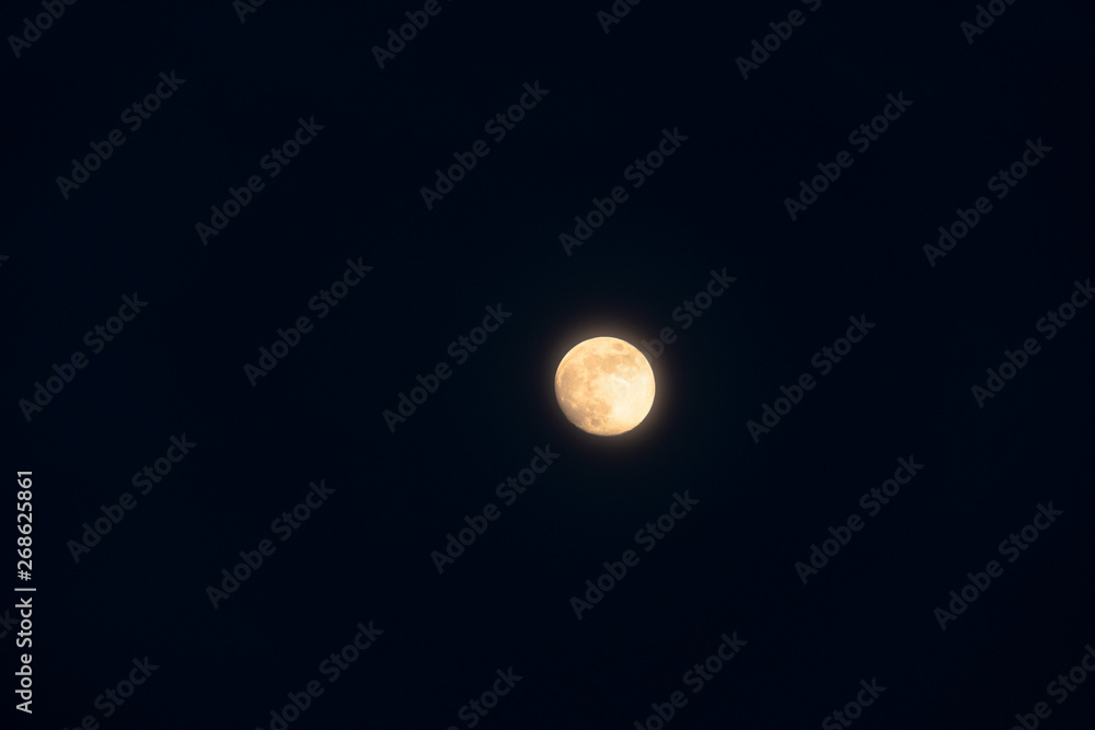 Full moon isolated on a black sky Full moon isolated on a black sky