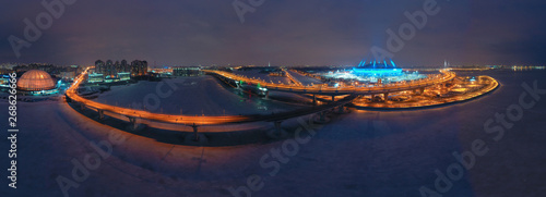 Saint-Petersburg, Krestovsky Island. Russia. The Neva River flows into the Gulf of Finland. High-speed highway. Stadium. Evening Petersburg. Cities of Russia. Bridges of Petersburg photo