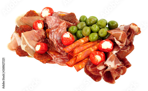 Gran antipasto snack selection with salami and cured meat slices isolated on a white background photo