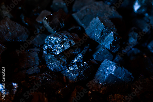 Coal or carbon on the dark background. Coal closeup.