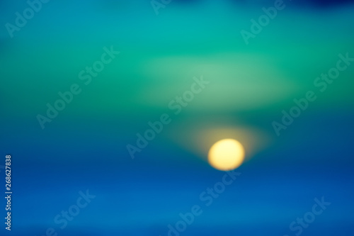 Out of focus abstract background of beautiful sunset on Bali.