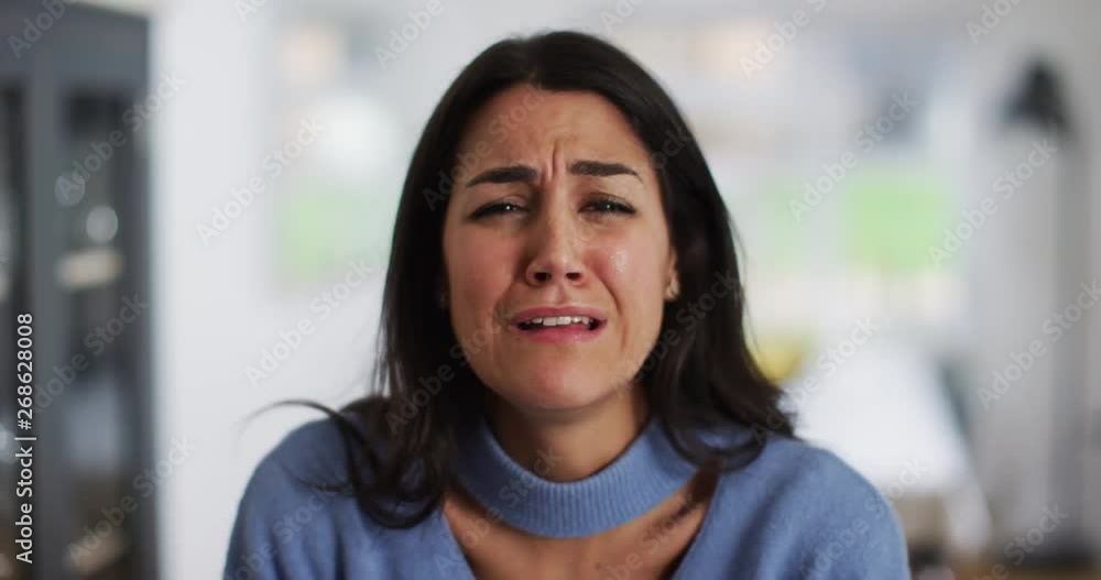 4K Close up of unhappy emotional woman looking at camera & crying. Slow motion. 4K Close up of unhappy emotional woman looking at camera & crying. Slow motion.