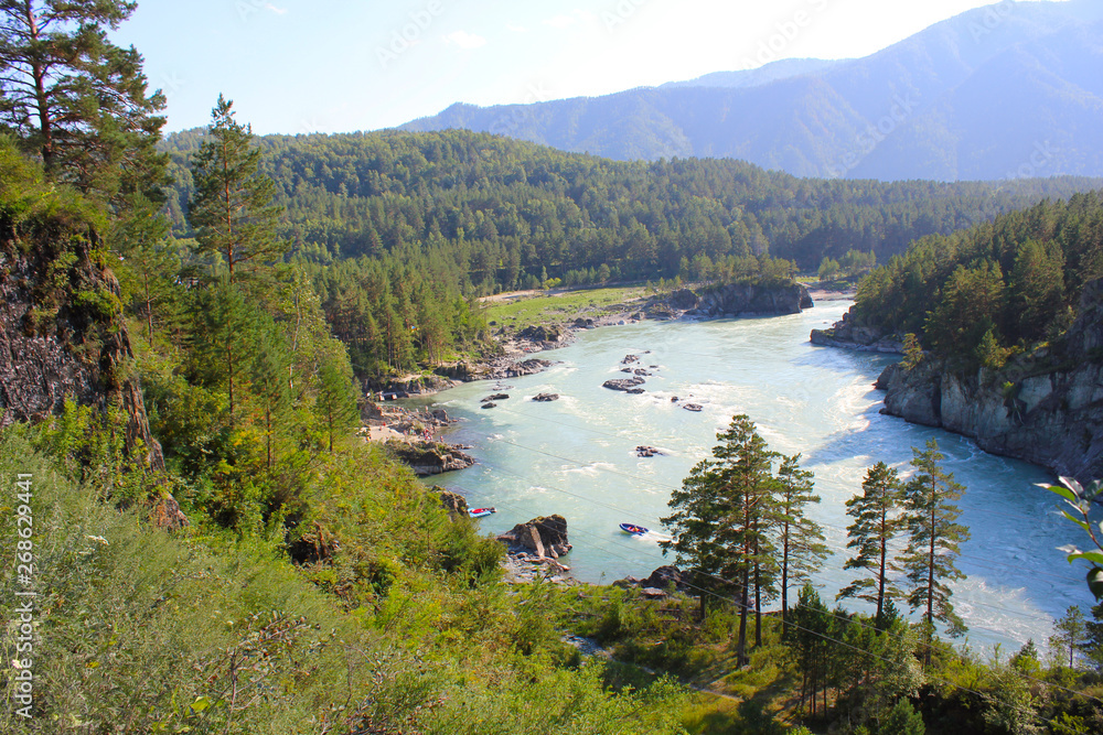 view from the mountain to the confluence of two rivers in the Altai Mountains