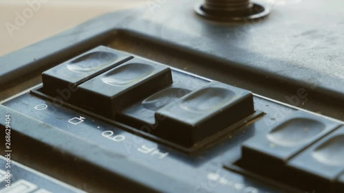 Wallpaper Mural Press a button on a vintage tape recorder. Close-up. A man presses control buttons on an audio player with his finger. Torontodigital.ca