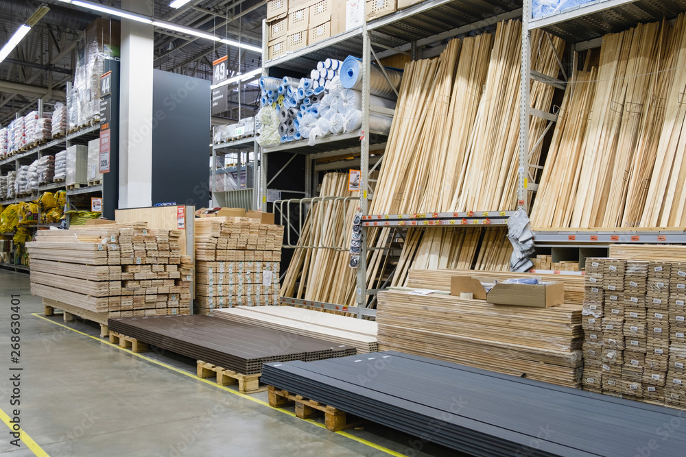 ST. PETERSBURG, RUSSIA - MARCH, 2019: Many wooden planks in hardware store