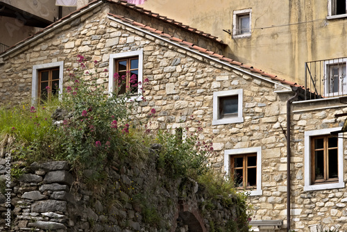 Fototapeta Naklejka Na Ścianę i Meble -  House with walls in white Carrara marble in the town of Colonnat